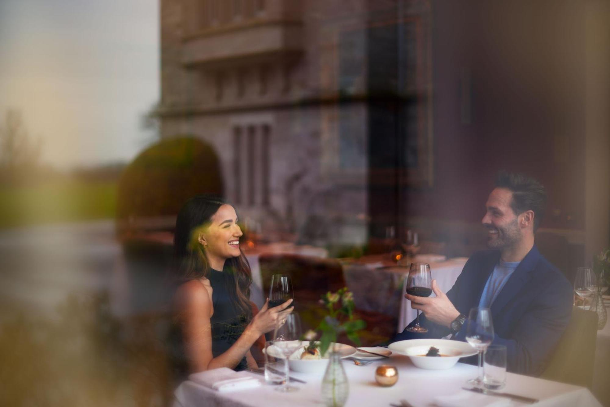 Schloss Roxburghe, Part Of Destination By Hyatt エクステリア 写真 A couple dining at a restaurant
